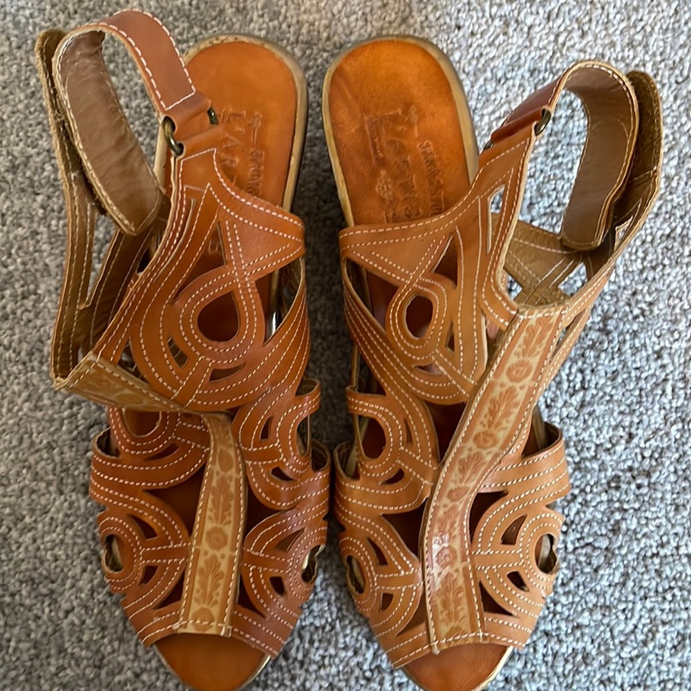 L’ Artiste wedge sandals.